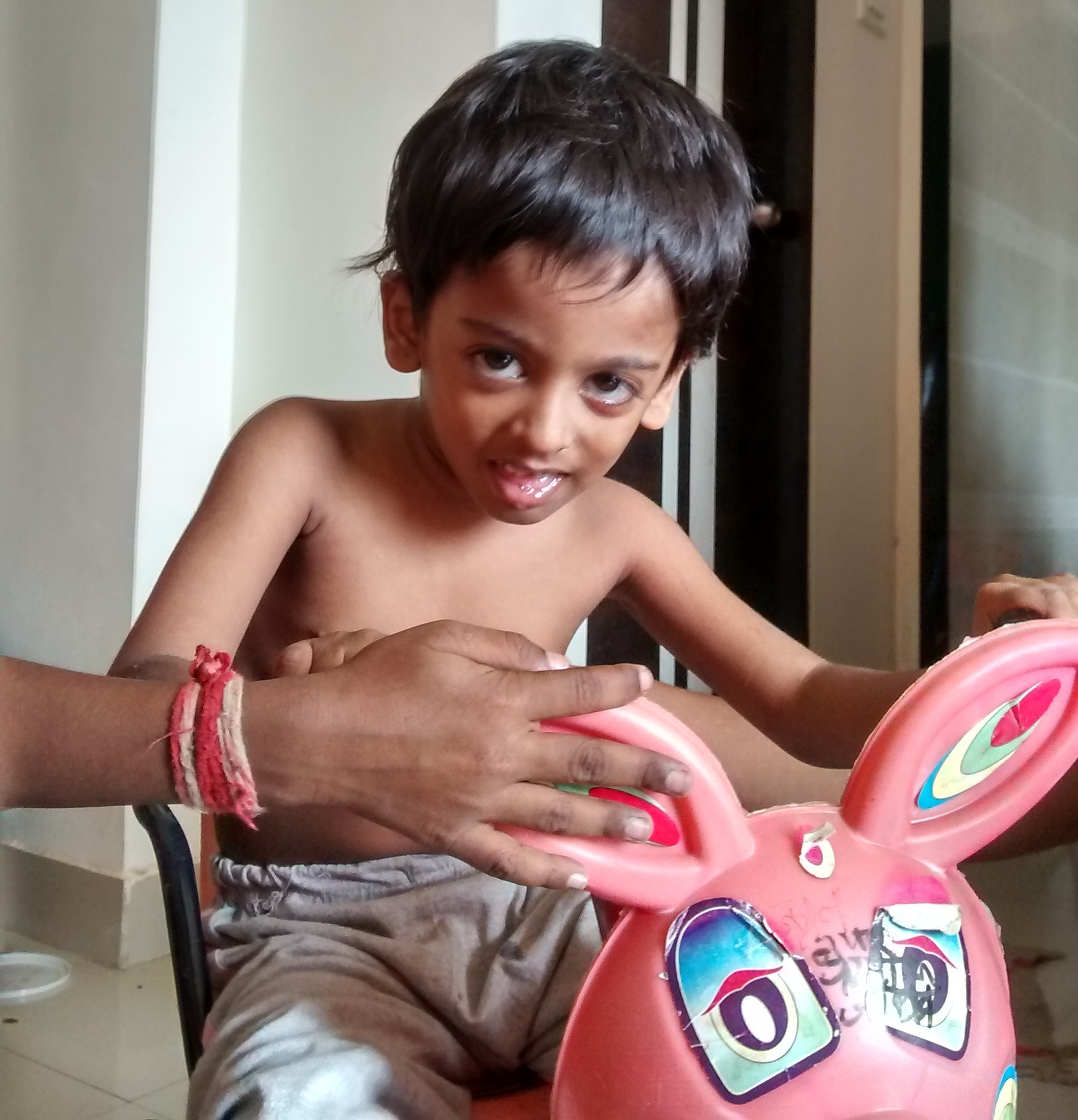 Nisarga and his tricycle